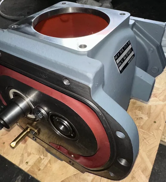Genuine Atlas Copco air end photographed for part-number identification